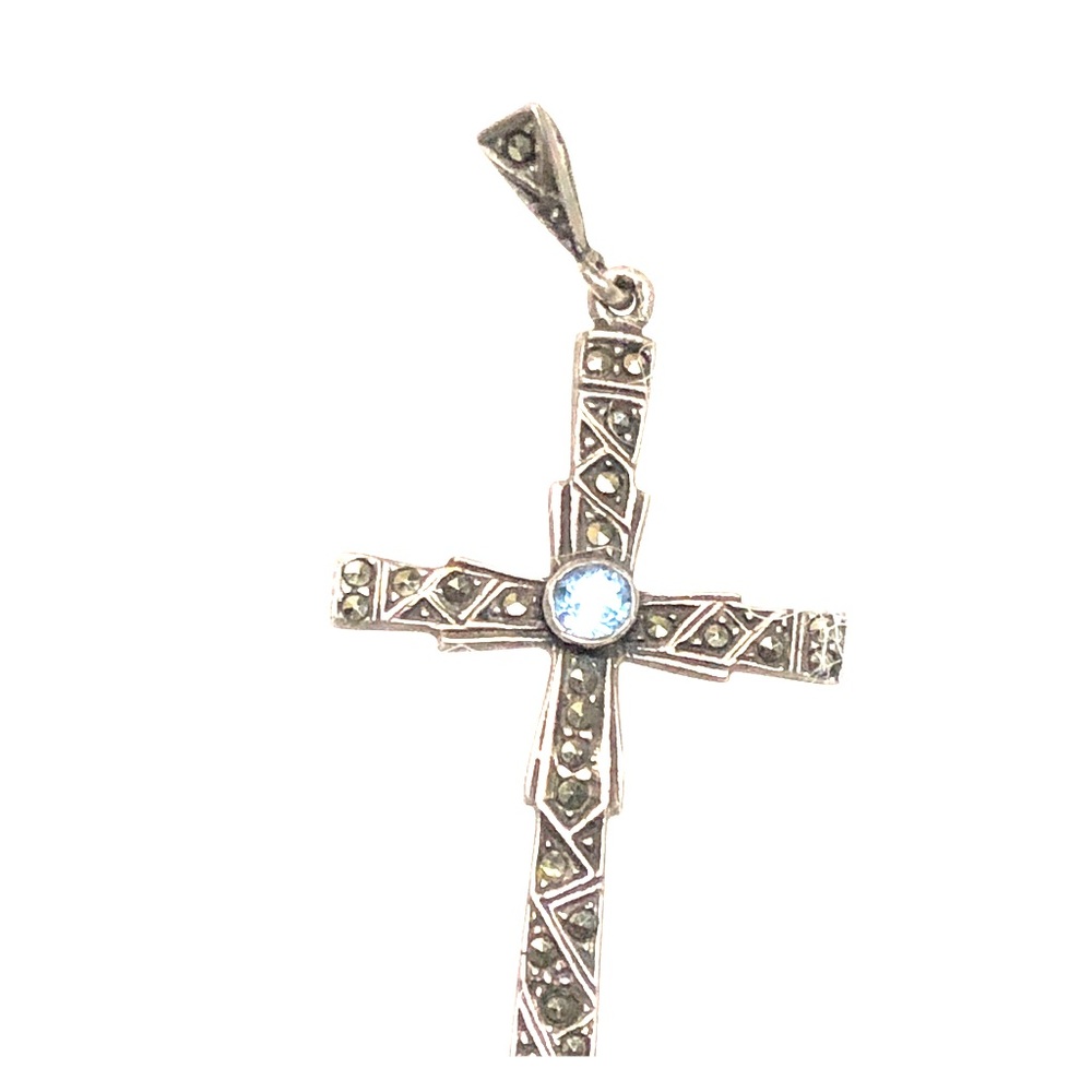 Silver cross with blue stone accent